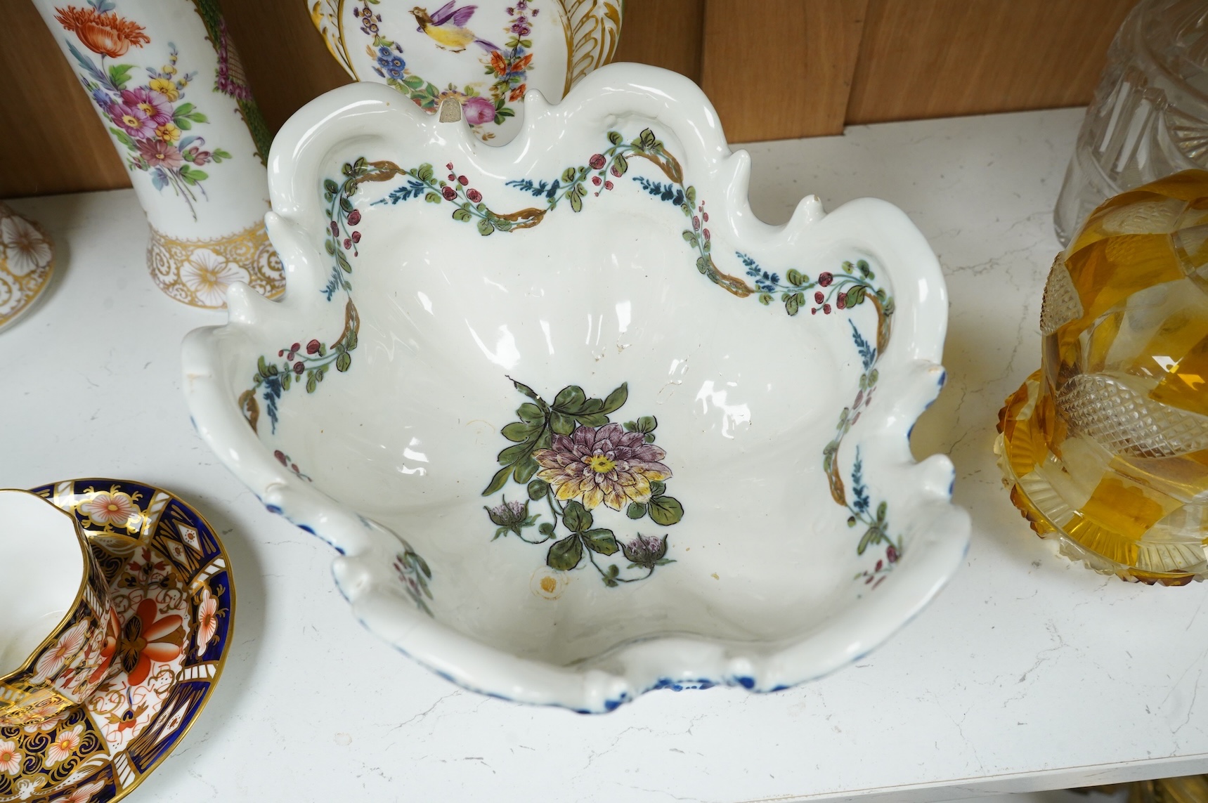 A pair of Dresden vases, a Paris porcelain bottle and stopper, a faience bowl and two Royal Crown Derby cups and saucers, tallest 26cm